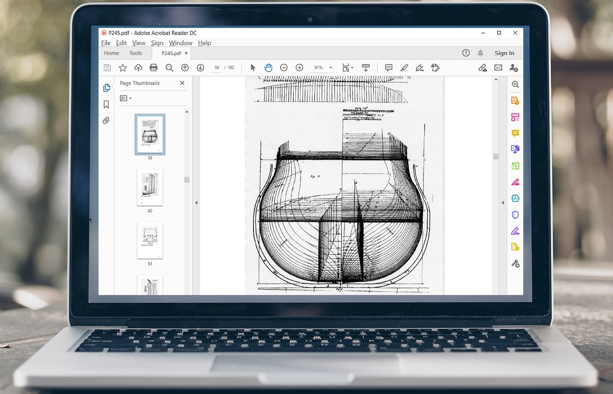 adob acrobat showing pdf on a laptop